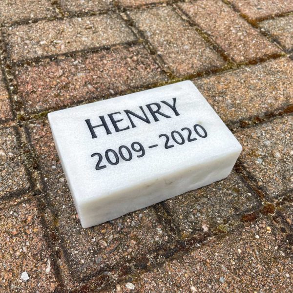 Orvis-style, marble brick memorial plain, from an angle